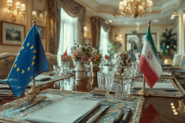 Diplomatieke onderhandelingstafel met EU en Iraanse vlaggen